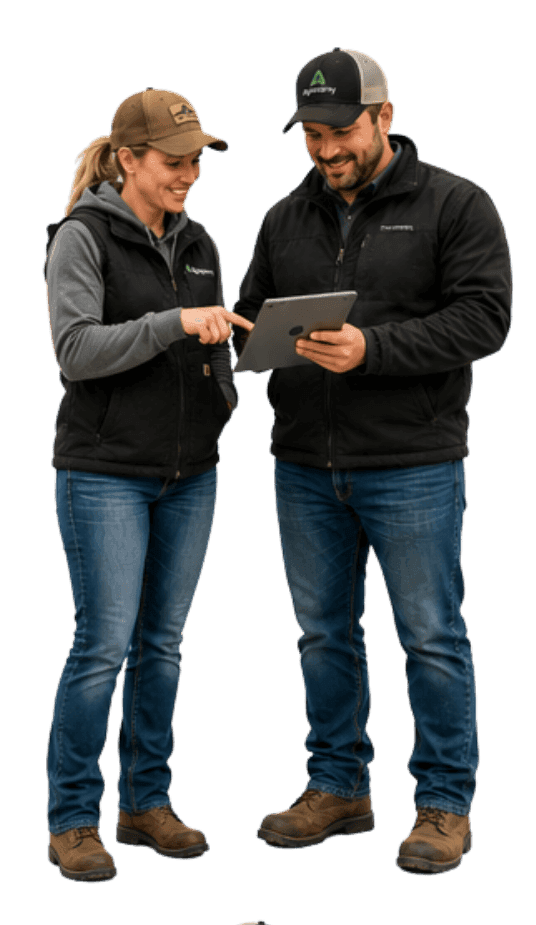 A grower and a service provider reviewing the Agnomy app on a tablet