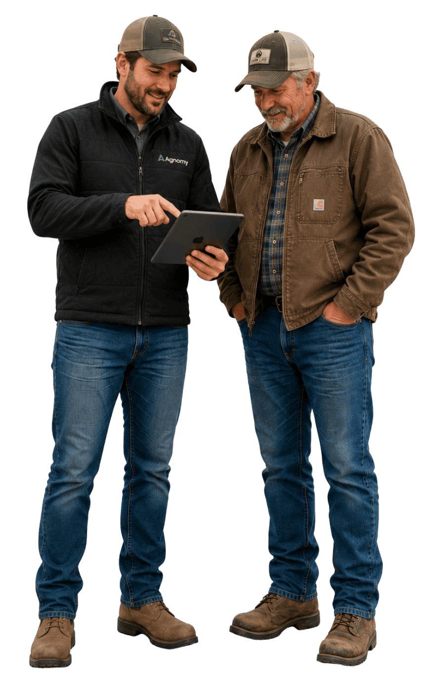 An ag service provider reviewing a job with a grower on a tablet